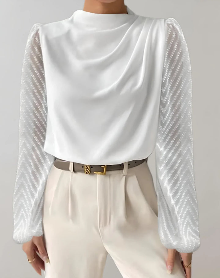 Lorene – witte damesblouse met mesh mouwen